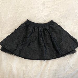Adorable faux leather rose detailed girls skirt